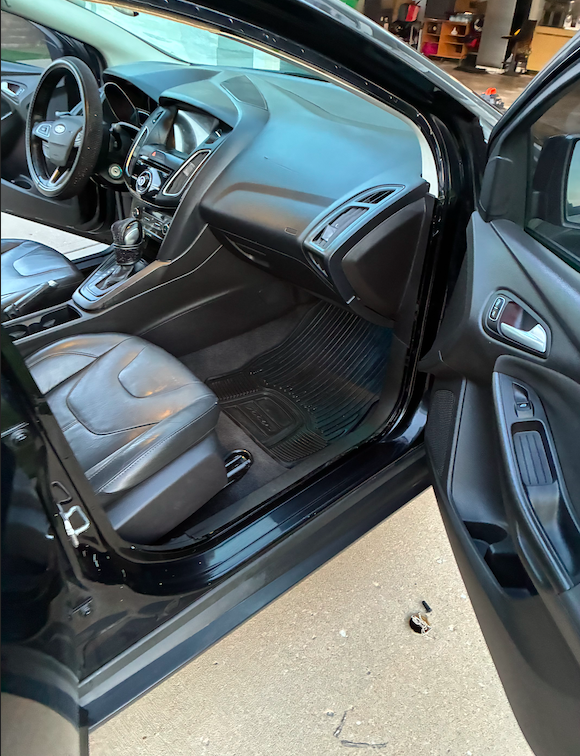 Black Ford Focus interior detail with leather seats and console