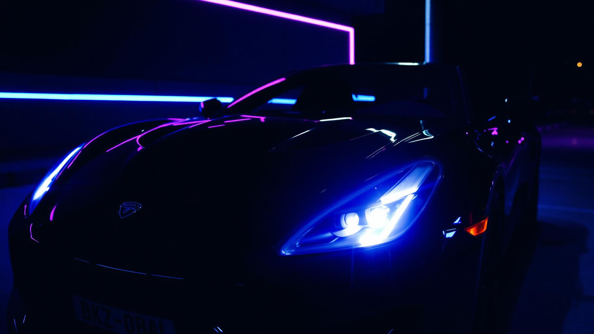 Glossy car exterior at night